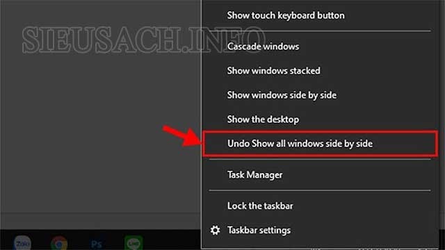 Taskbar → Undo show windows side by side để đưa màn hình trở về bình thường.